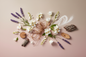 generate an image showing individual notes for a modern product image, in a pink/beige/taupe background, including: english lavender, jasmine, lily of the valley, vetiver, night-blooming moonflowers, musk, woods